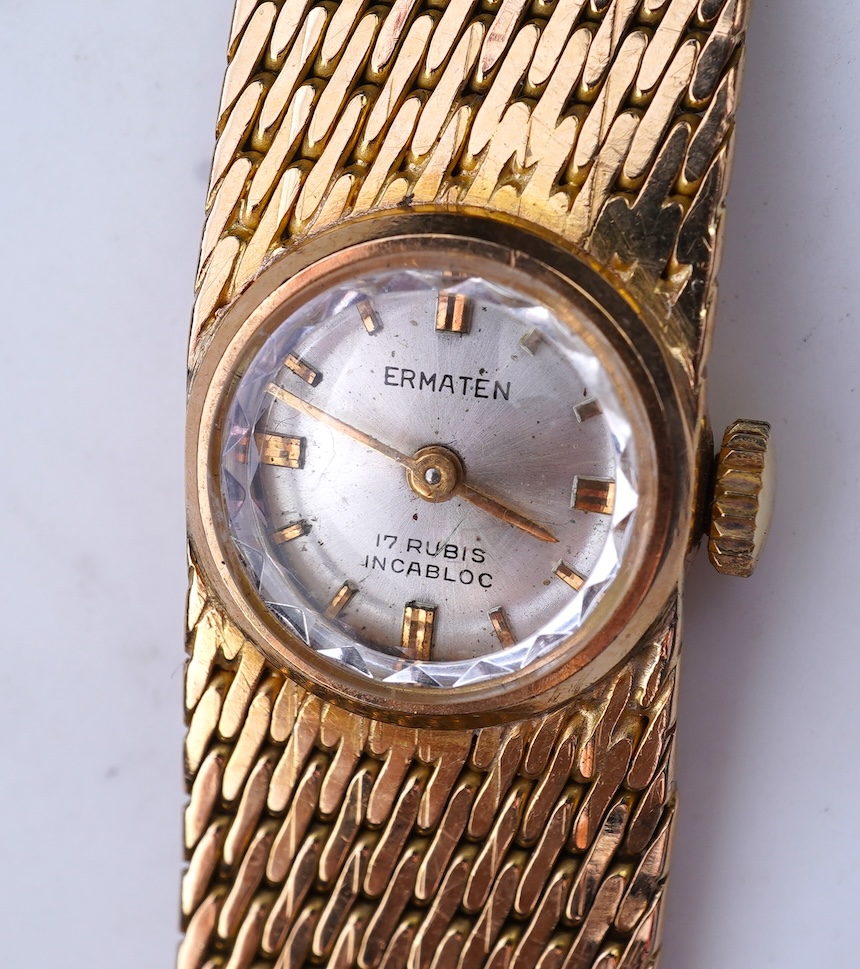 Ermaten, a gold watch